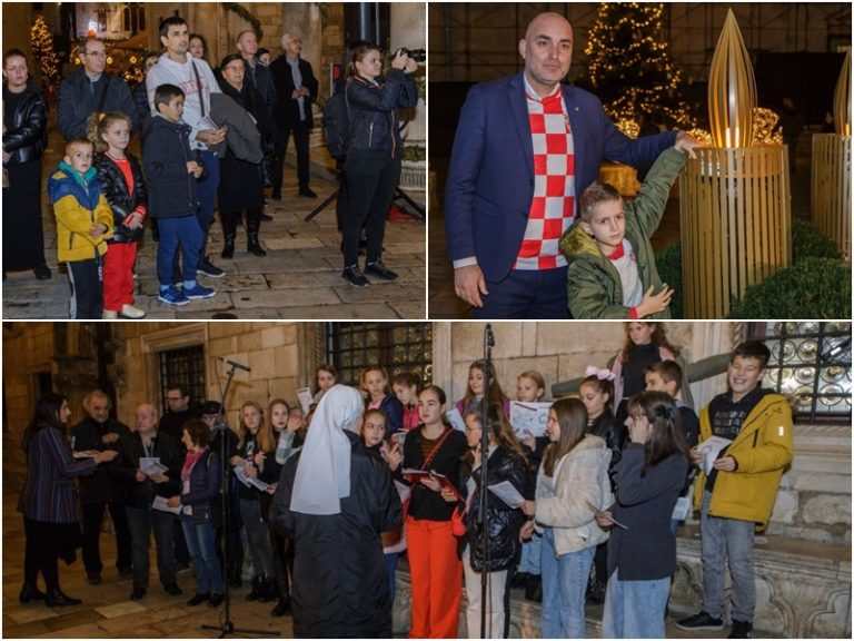 Upaljena četvrta svijeća na adventskom vijencu